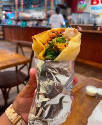 Botiwalla by Chai Pani signature dishes Lamb Boti Kabab RollChicken Tikka RollMasala Smashed Potatoes